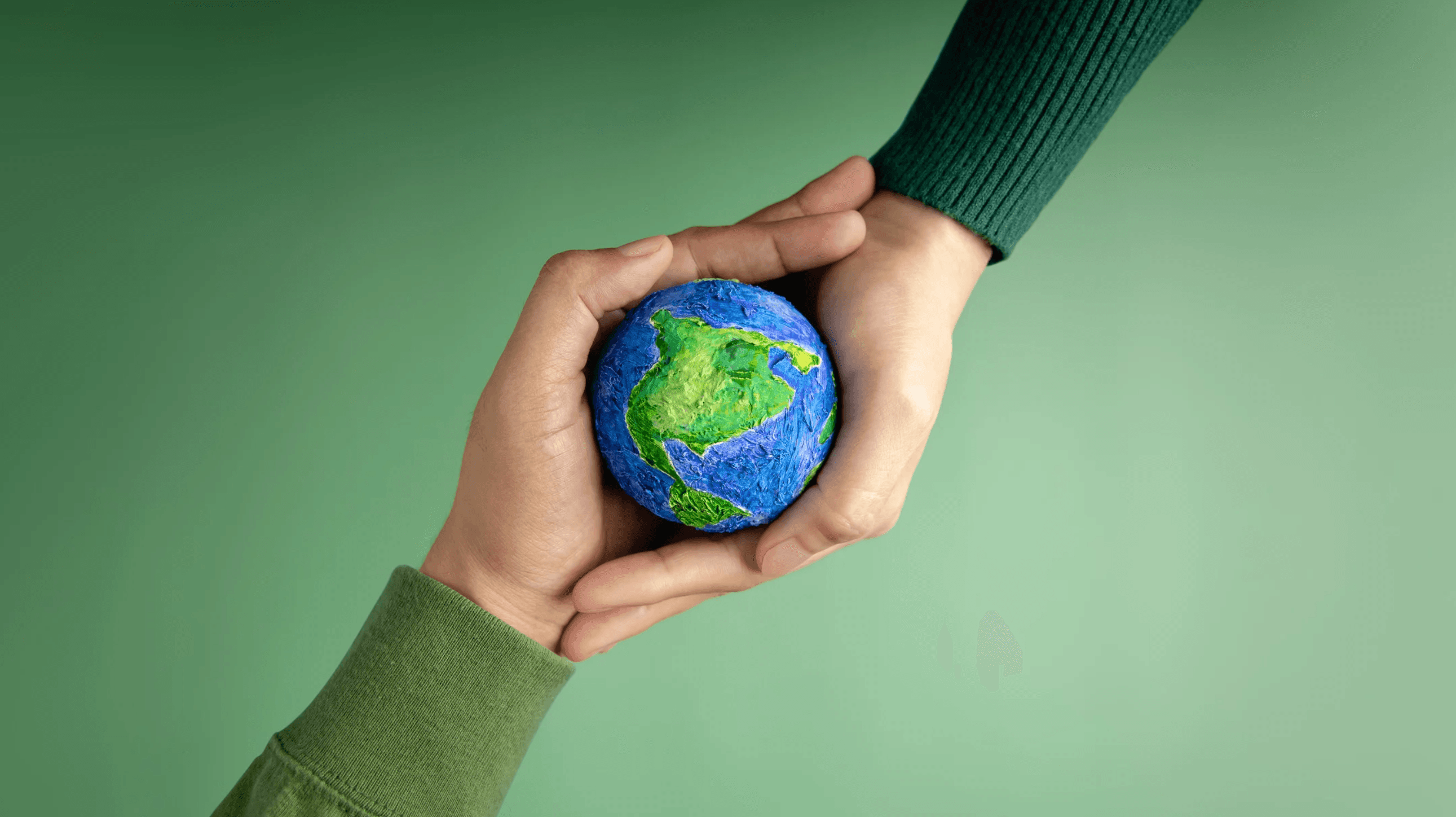 Hands holding Earth - Environmental sustainability